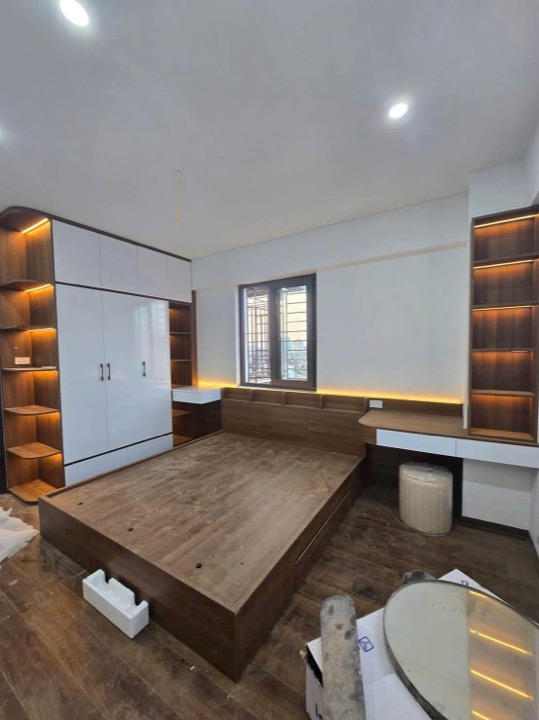 Giường và tủ áo MDF vân gỗ đèn LED do xưởng Đức Ngọc thi công